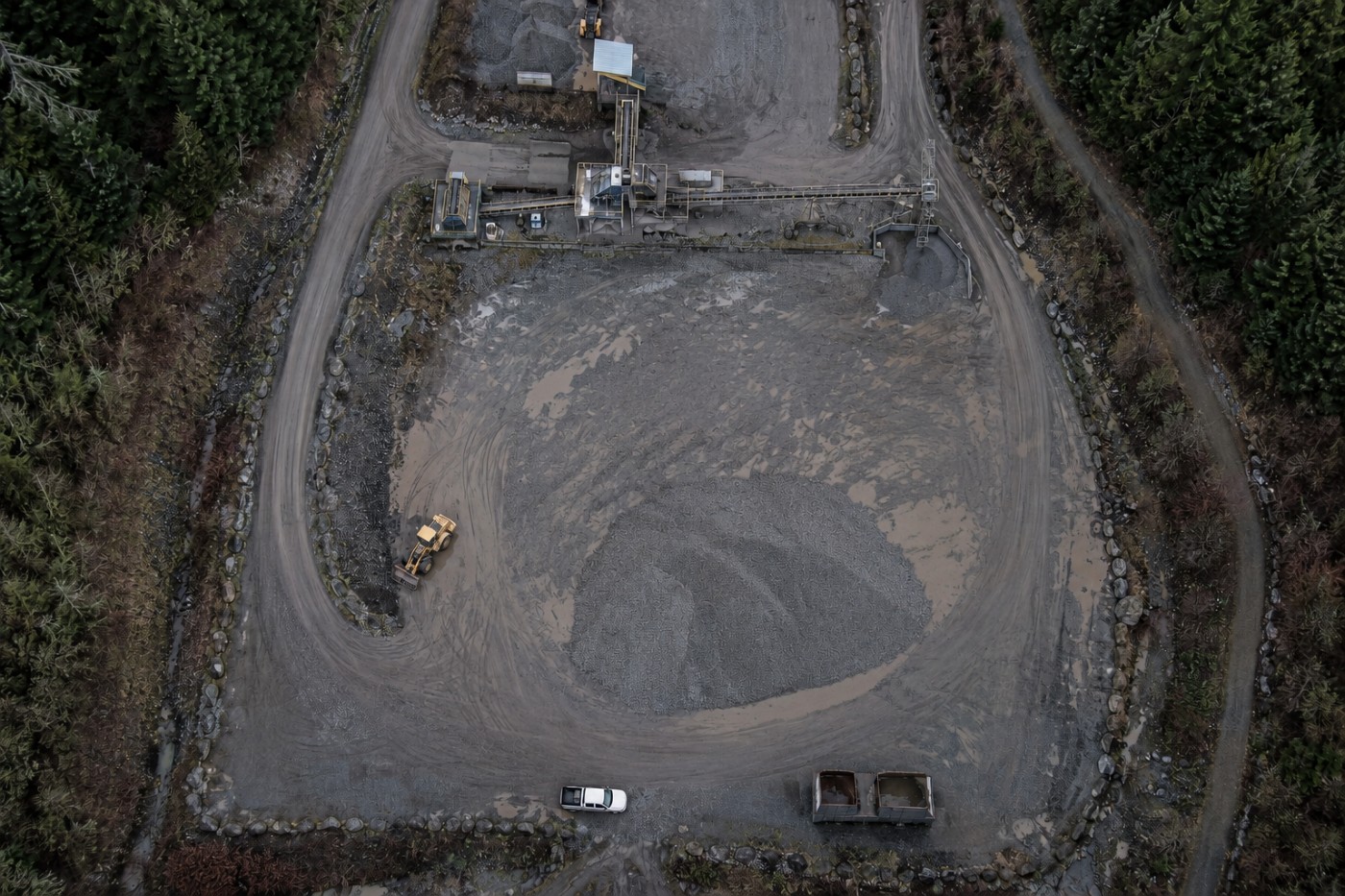 The same stockpile after drawdown, flown from the same altitude and heading